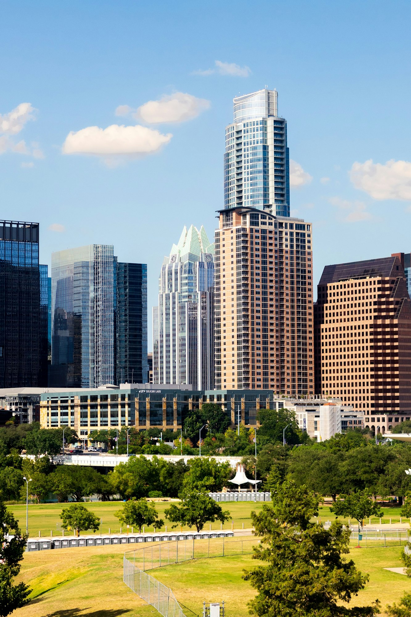 Vertical shot of the beautiful park and buildings located in Austin, Texas